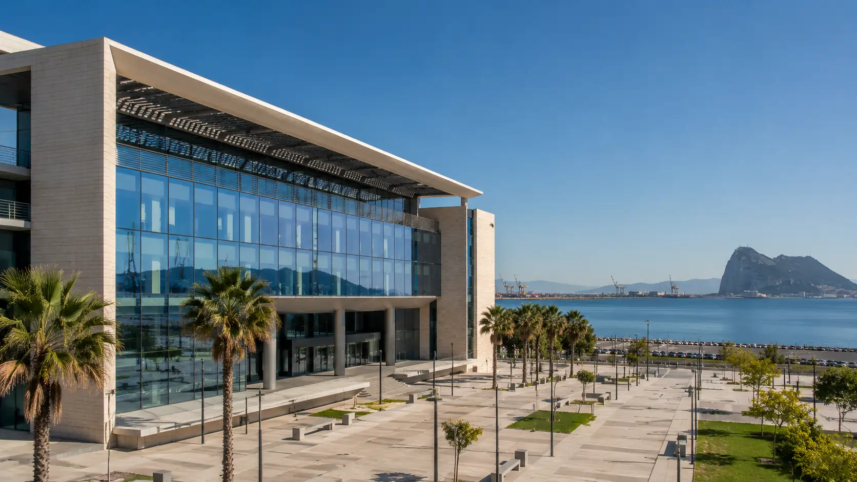 Administrative headquarters building of the Autoridad Portuaria Bahía de Algeciras with the Bay of Algeciras in the background